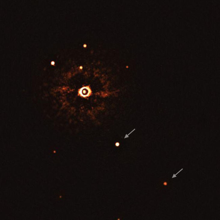 Multiplanet system around sunlike star photographed for 1st time ever