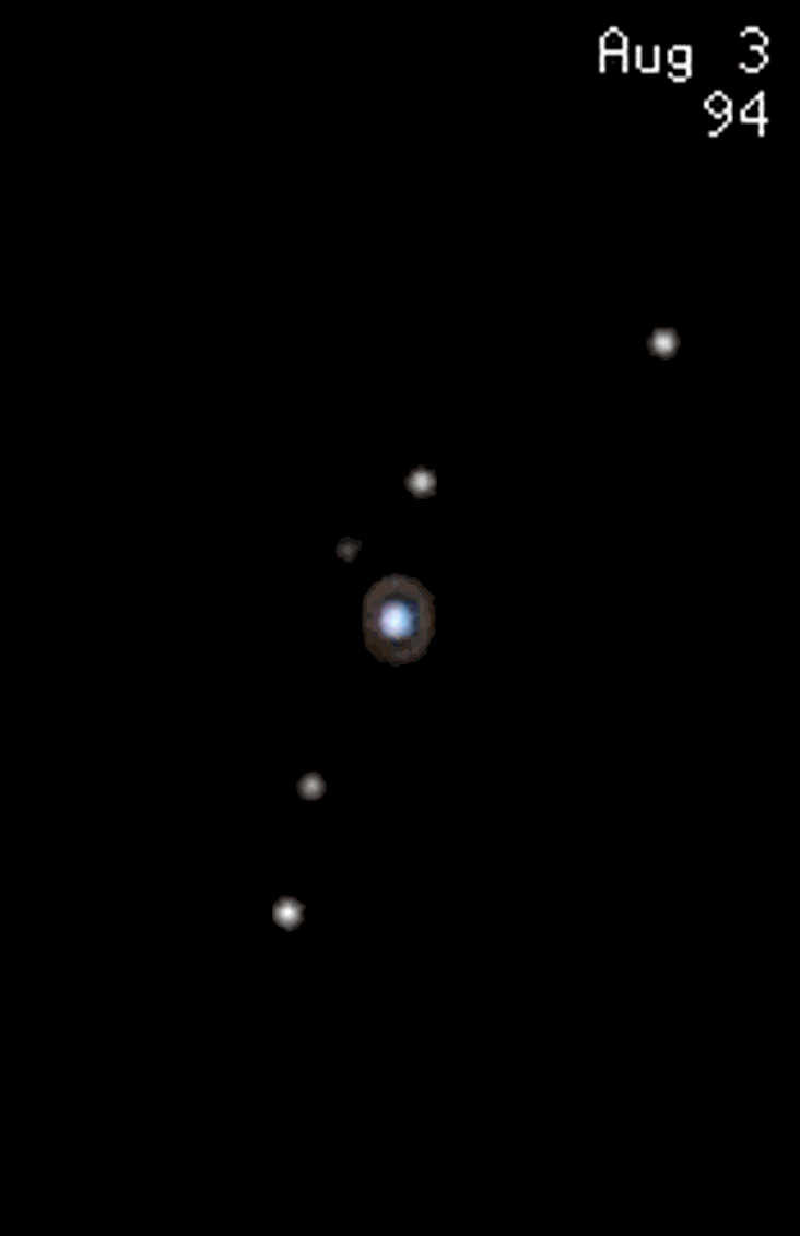 Hubble shows us Uranus, and the motion of its moons.
