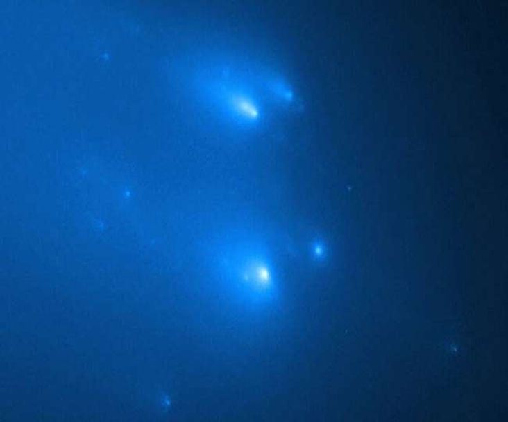 Comet Atlas broken in the sky: